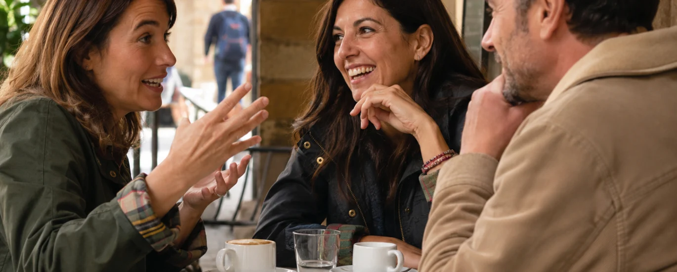 spanish people having lunch an talking with hand gestures